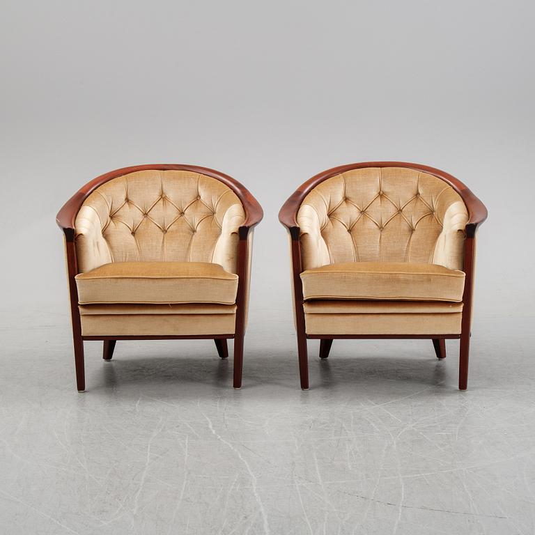 A pair of mahogany and velvet easy chairs by Bröderna Andersson, 1960's.