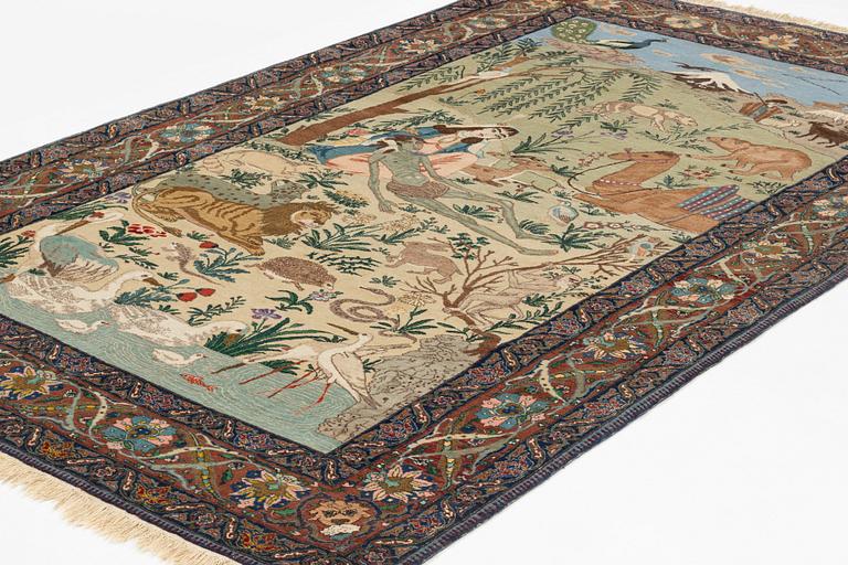 A carpet, semi-antique, Tabriz, signed, ca 271 x 175 cm.