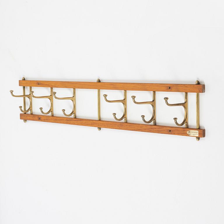 Klädhängare, "Dekorativ", Skoglunds metallgjuteri, Anderstorp, 1950/60-tal.