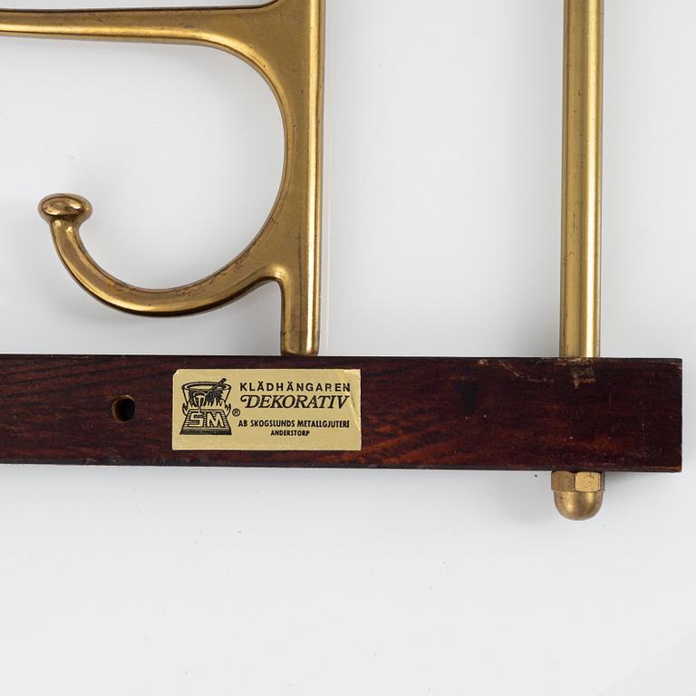 Klädhängare, ett par, "Dekorativ", Skoglunds metallgjuteri, Anderstorp, 1900-talets mitt.