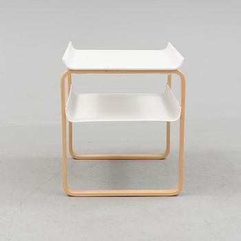 An occational table model 915 by Alvar Aalto for Artek.