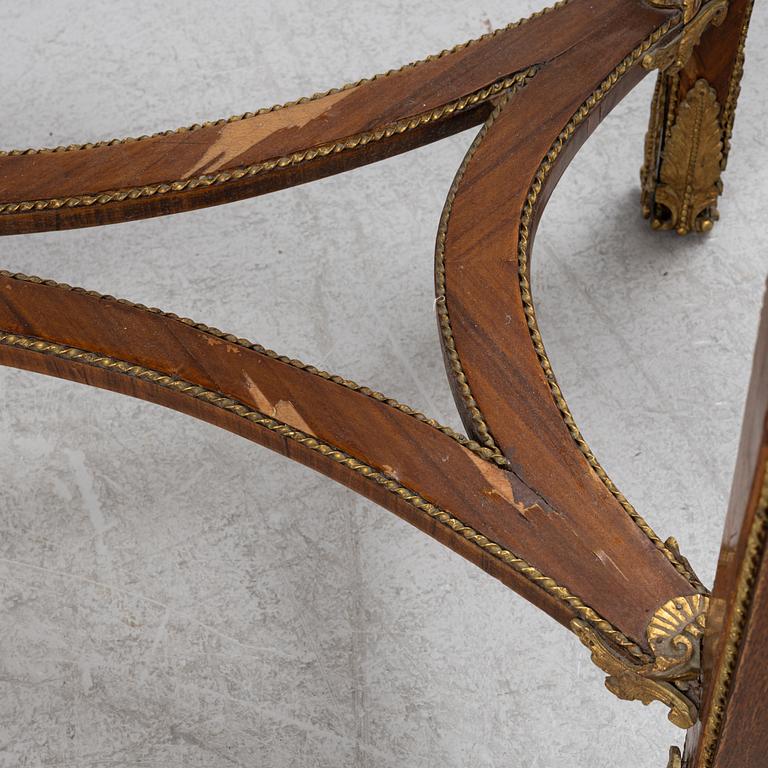 A Louis XVI-style gilt-brass mounted console table, circa 1900.