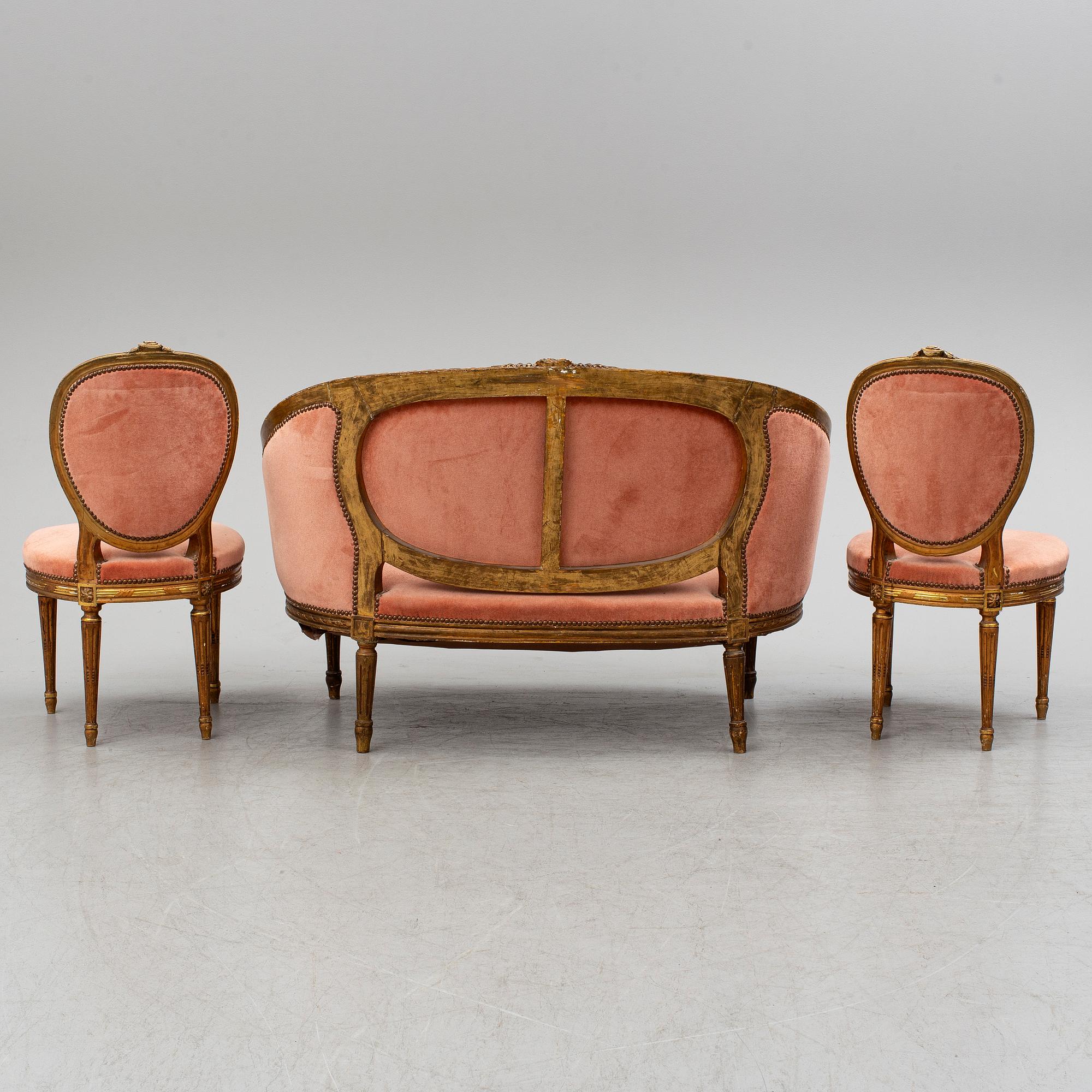 A sofa and a pair of chairs, Louis XVI-style, late 19th century.