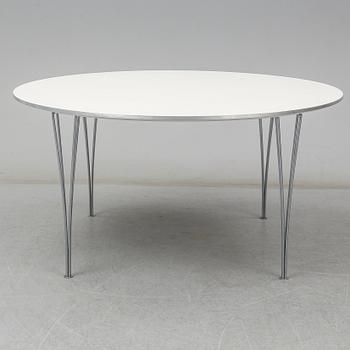 A 'Supercircle' table by Bruno Mathsson & Piet Hein for Fritz Hansen.