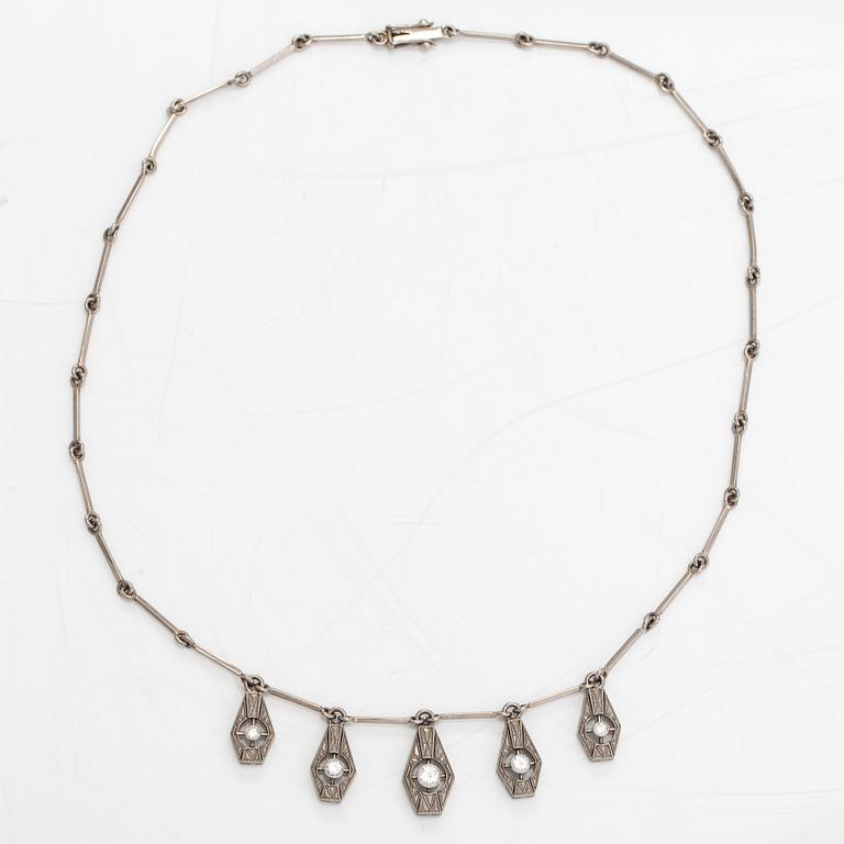 A necklace, ring and earrings, 14K gold and diamonds ca. 0.92 ct in total. Westerback, Helsinki 1964-1973.