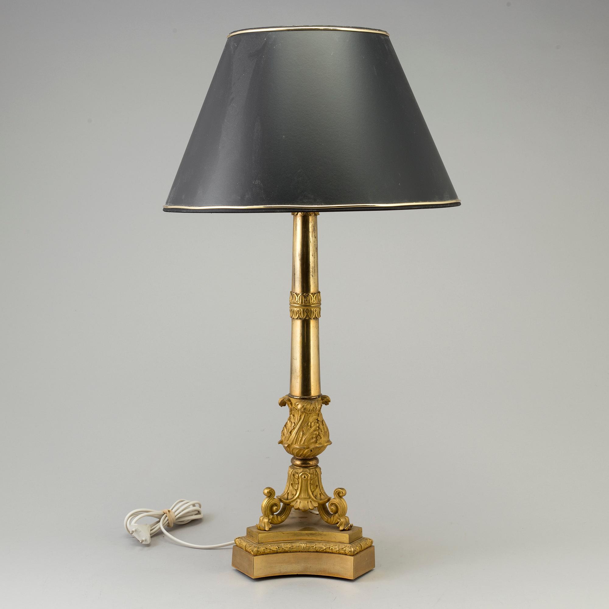 A LATE EMPIRE ORMOLU TABLE LAMP, mid 19th century.