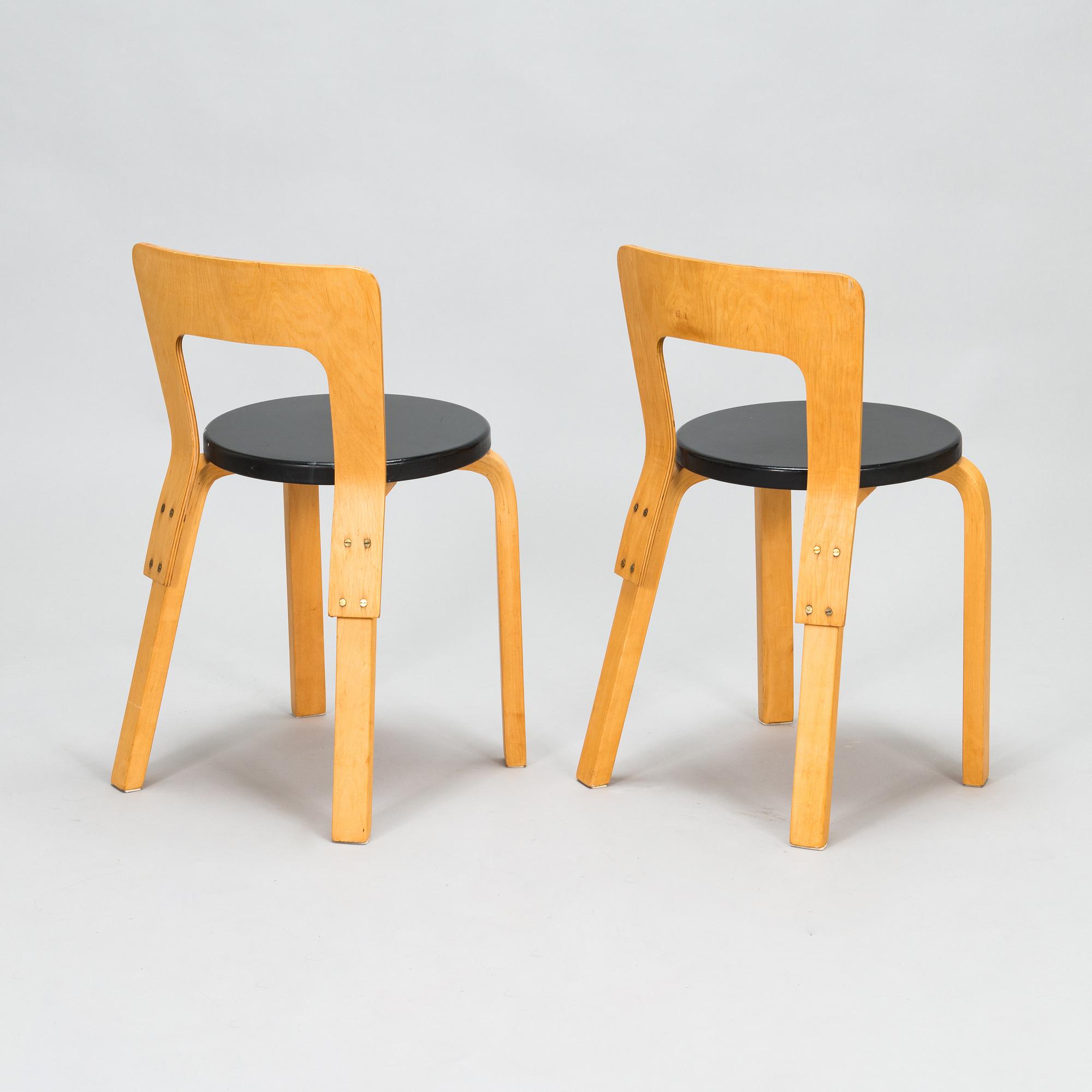 Alvar Aalto, four 1950s chairs, model 65, Artek.