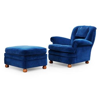 23. A Josef Frank 'model 336' easy chair with stool, Svenskt Tenn, Sweden.