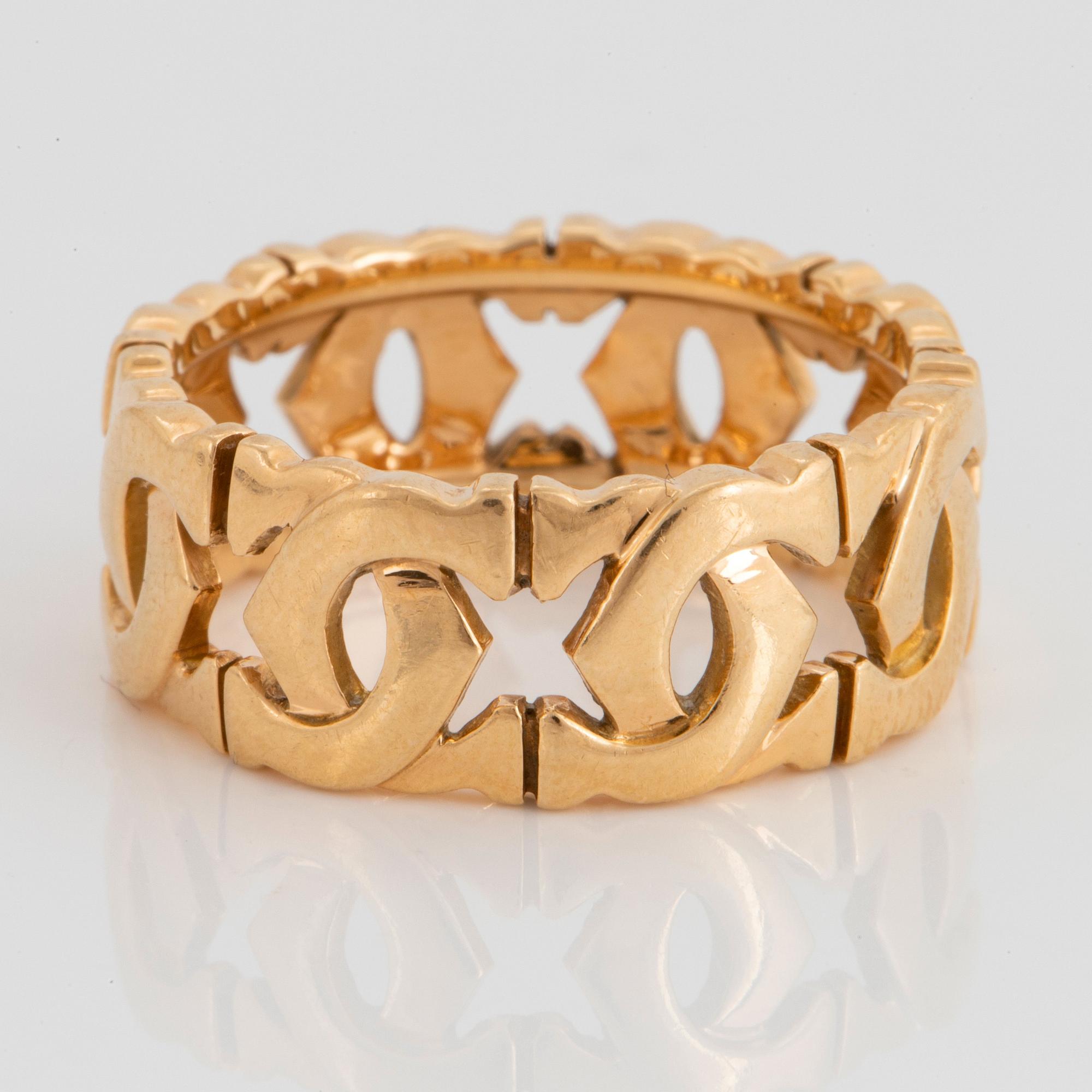 An 18K gold Cartier "Double C" ring.