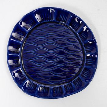 Hertha Bengtson, a stoneware bowl and twelve plates, Rörstrand, Sweden.
