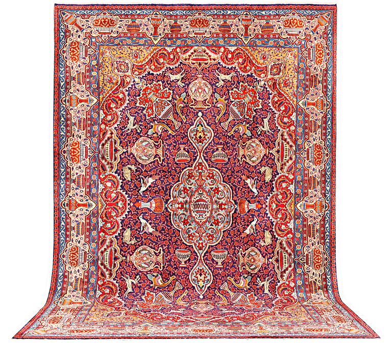 A Kashmar carpet, c. 415 x 285 cm.