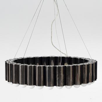 A  "Carousel" ceiling lamp, Lee Broom, contemporary.