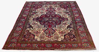 An antique Isfahan rug, Central Persia, c 234 x 146 cm.