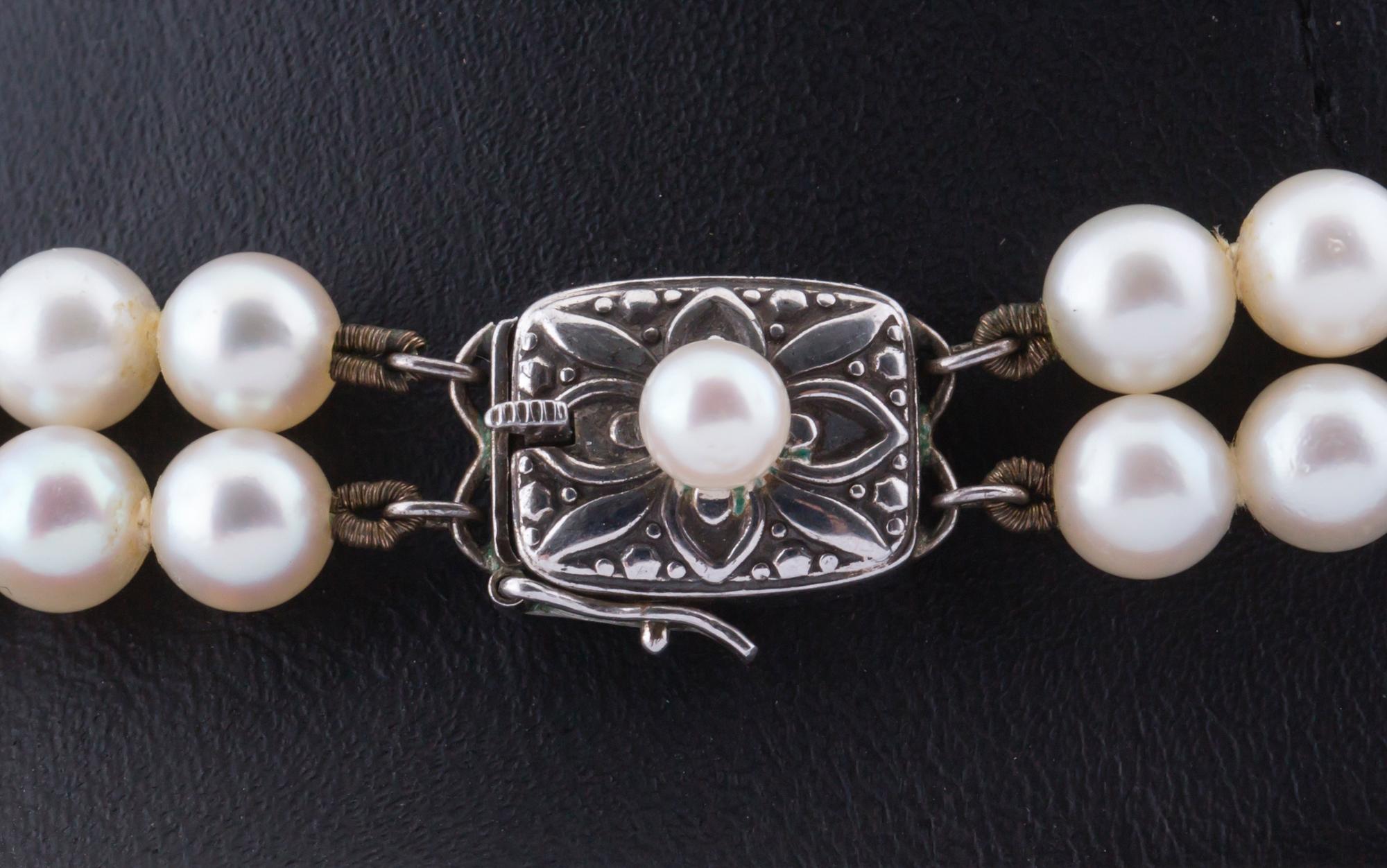 PÄRLCOLLIER, två-radigt, Mikimoto, Japan, odlade pärlor, originallås i silver.