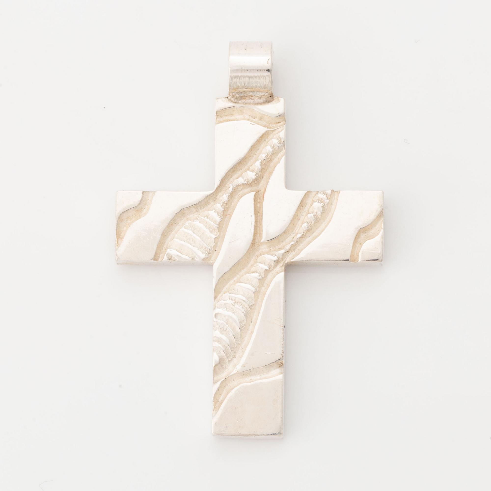 Rolf Karlsson a silver cross.