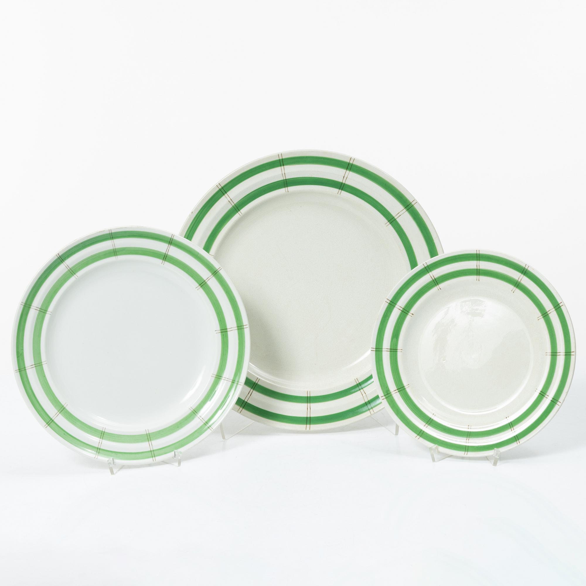 Wilhelm Kåge, a 25-piece creamware dinner service, 'Bungalow', Gustavsberg, Sweden, manufactured between 1936-1939.