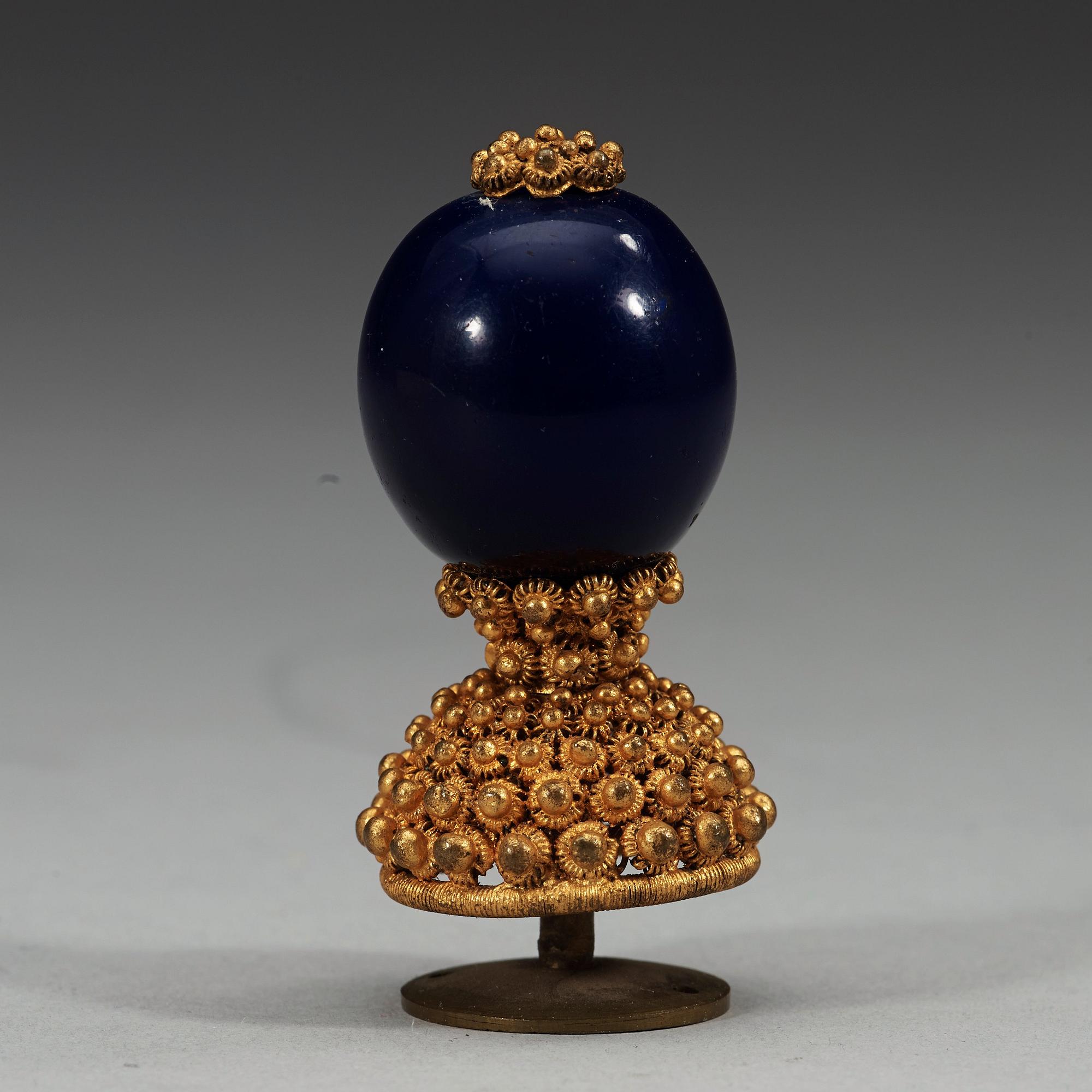 A set of fourteen Mandarin hat buttons, late Qing dynasty (1644-1912).