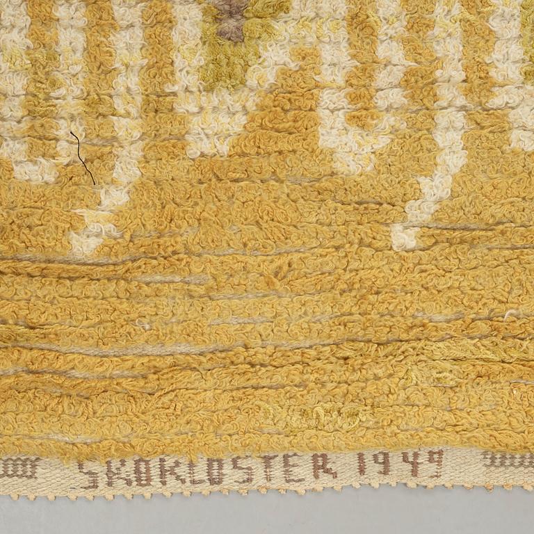 Brita Grahn, A CARPET, knotted pile, ca 429 x 201 cm, signed H & M Brita Grahn as well as SKOKLOSTER 1949.