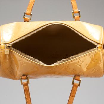 LOUIS VUITTON, a 'Bedford' yellow vernis bag.