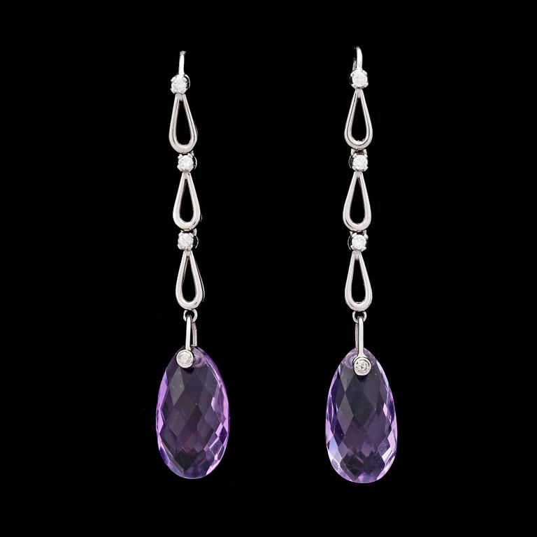 EARRINGS, briolett cut amethysts with brilliant cut diamonds, tot. app. 0.30 cts.