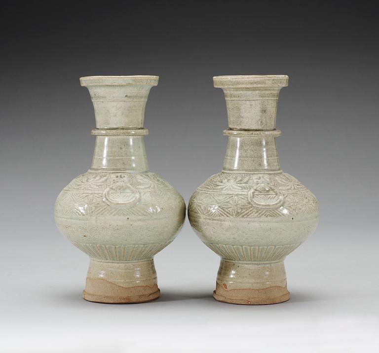 A pair of pale celadon glazed vases, Song/Yuan dynasty.