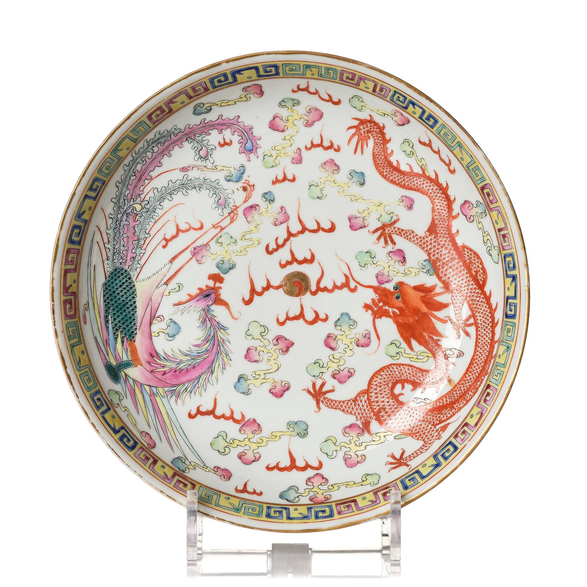 A phoenix and dragon famille rose dish, Qing dynasty, with Guangxu six character mark and period (1875-1908).