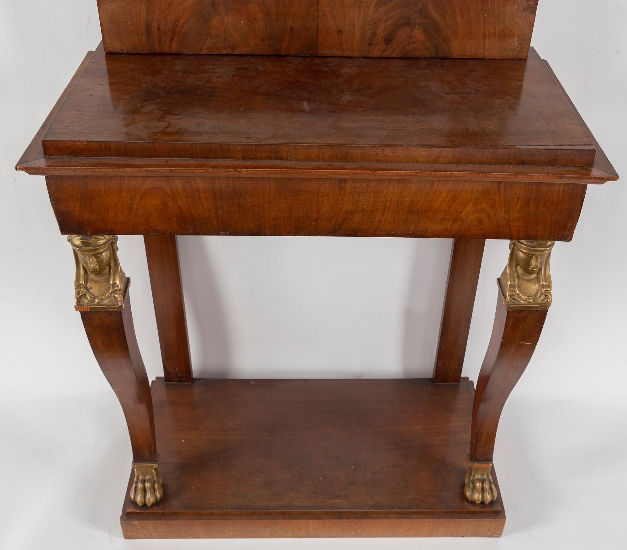A Swedish Empire mirror and console table, first half of the 19th century.