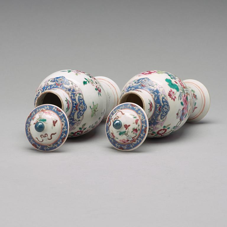 A pair of famille rose vases with covers, Qing dynasty, Qianlong (1736-95).