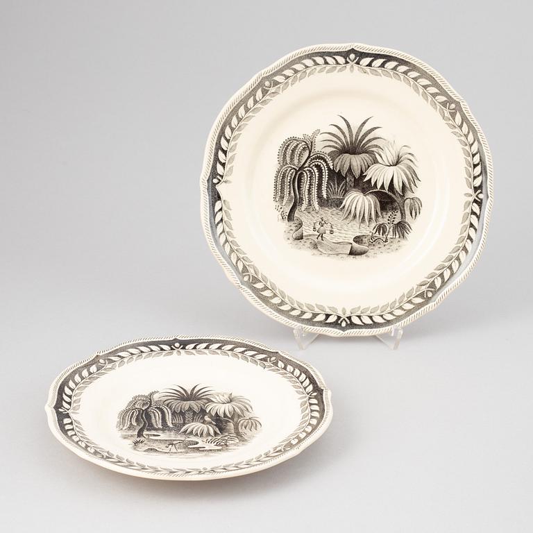 A 67 piece 'Exotica' creamware dinner service by Arthur Percy, Gefle.