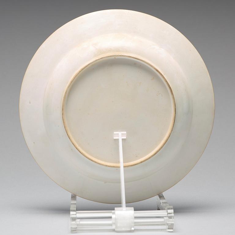 A set of eight blue and white armorial soup dishes, Qing dynasty, 18th Century.