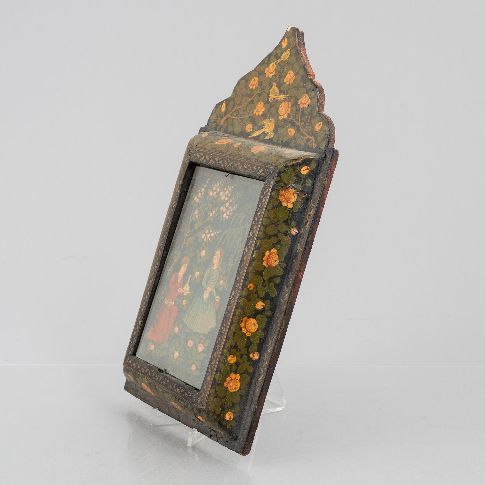 A figure scene in a richly decorated frame, Persia, first half of the 20th century.