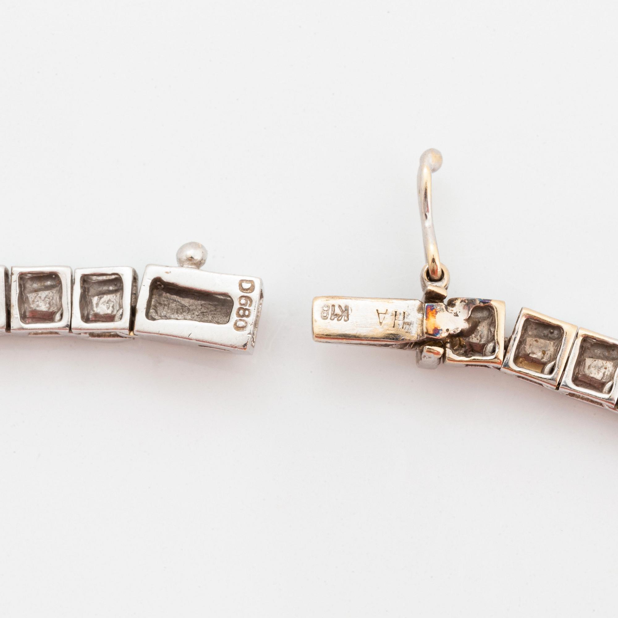 Collier rivière 18K vitguld runda briljantslipade diamanter.