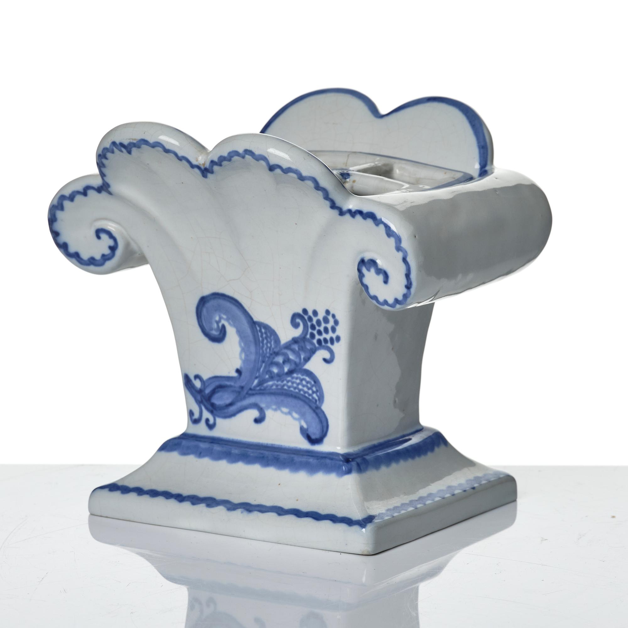 Wilhelm Kåge, eleven pieces of faience including jars, inkwells and a tulip vase, Gustavsberg, Sweden, 1919-1920.