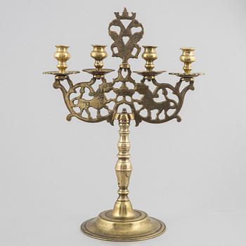 A brass Baroque style candelabra, 18th/19th century.