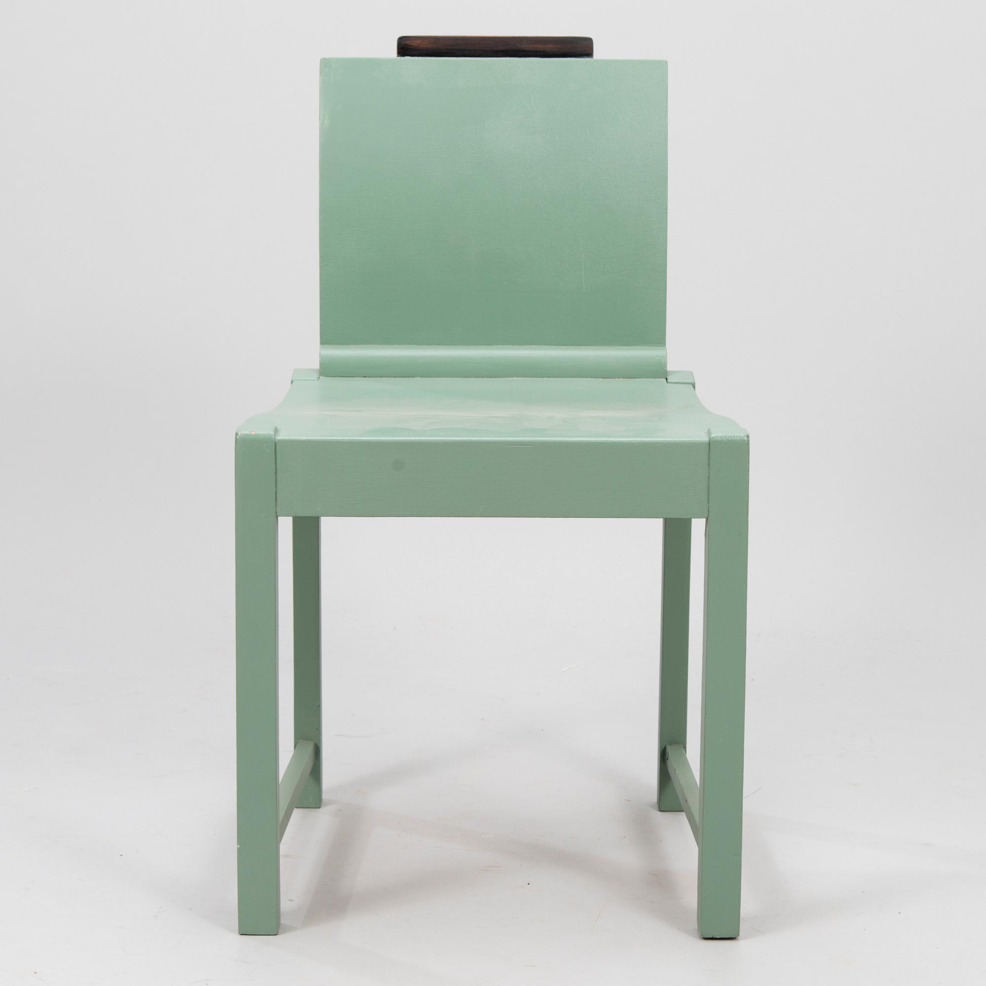 ERIK BRYGGMAN, A wooden chair, 1920's.