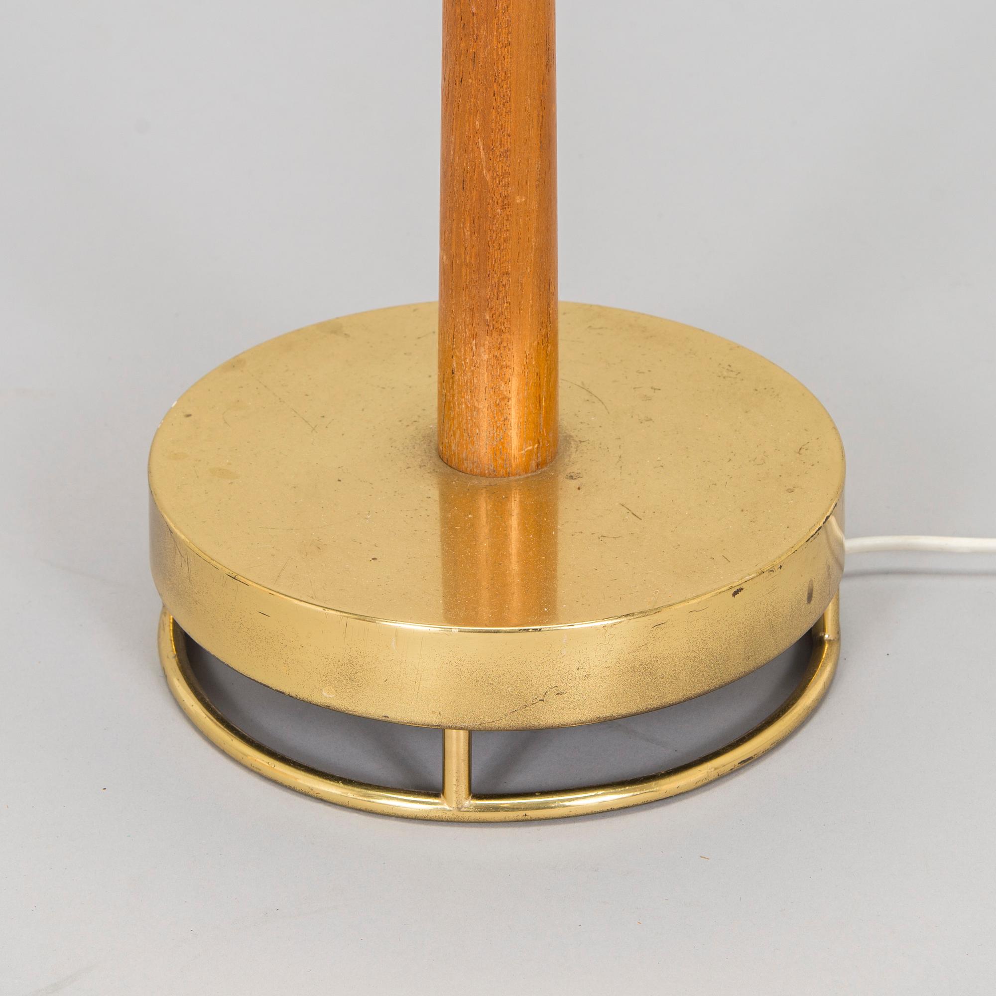 A mid-20th century floor lamp for Idman.