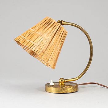 PAAVO TYNELL, a model 61032 table light from Idman, Finland.