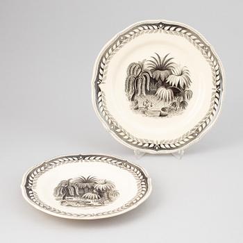 A 67 piece 'Exotica' creamware dinner service by Arthur Percy, Gefle.
