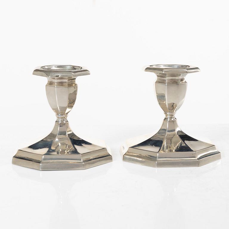 A pair of silver candelsticks, GAB, 1928.