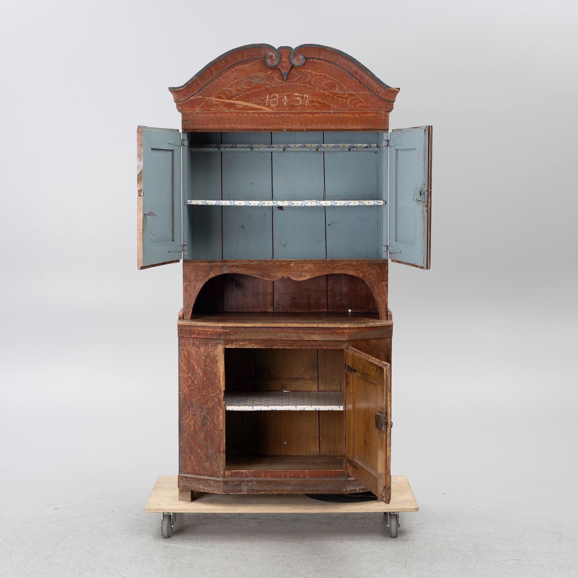 A 19th century Folk art gift cabinet.