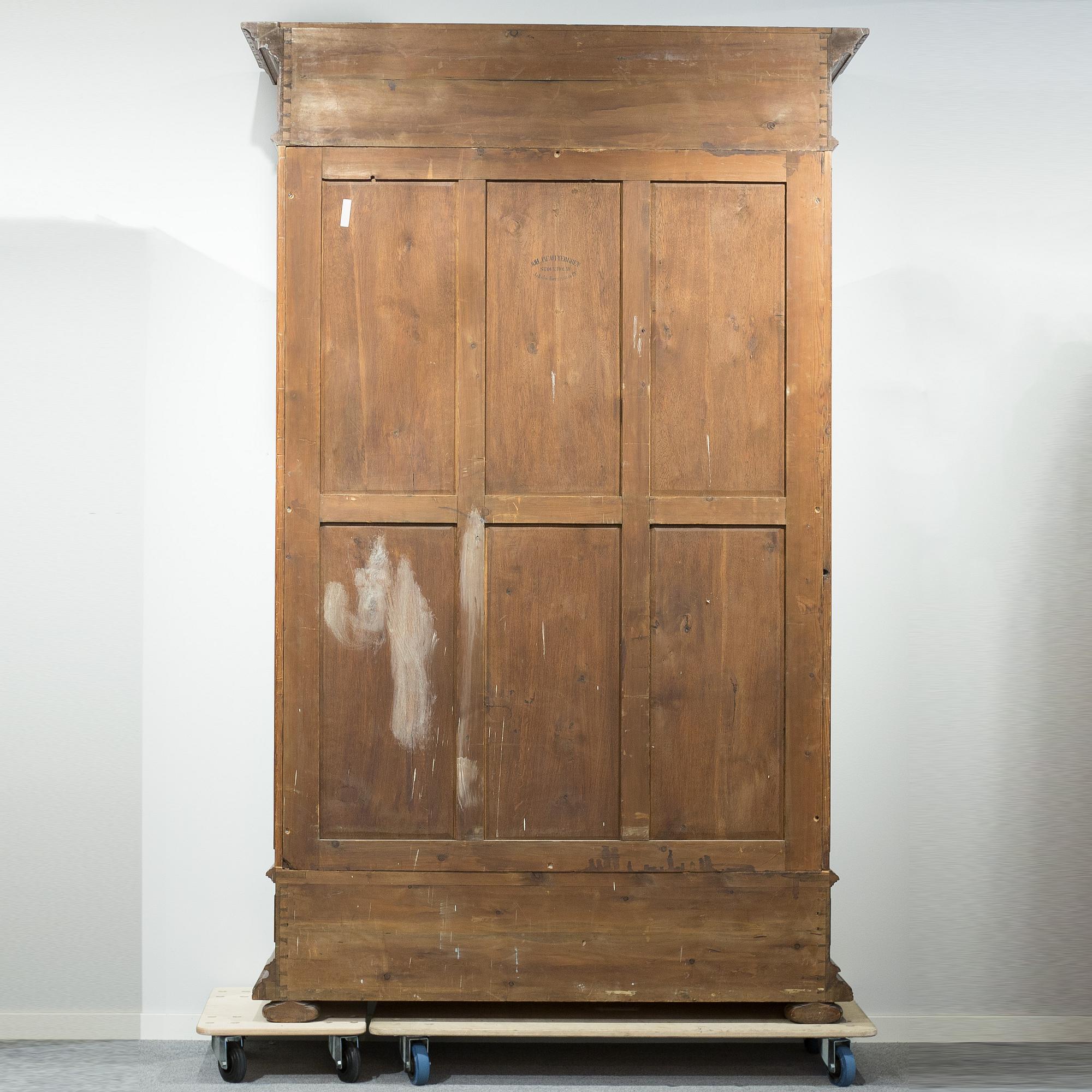 a oak vitrine cabinet from the late 1800's.