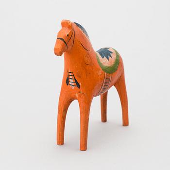 A painted folk art dala horse first half of the 20th century.