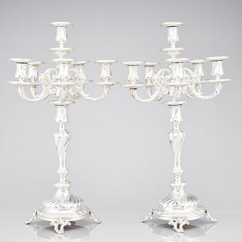 A pair of Swedish silver candelabra, mark of Gustaf Möllenborg (Carl Teodor Feron), Stockholm 1896.