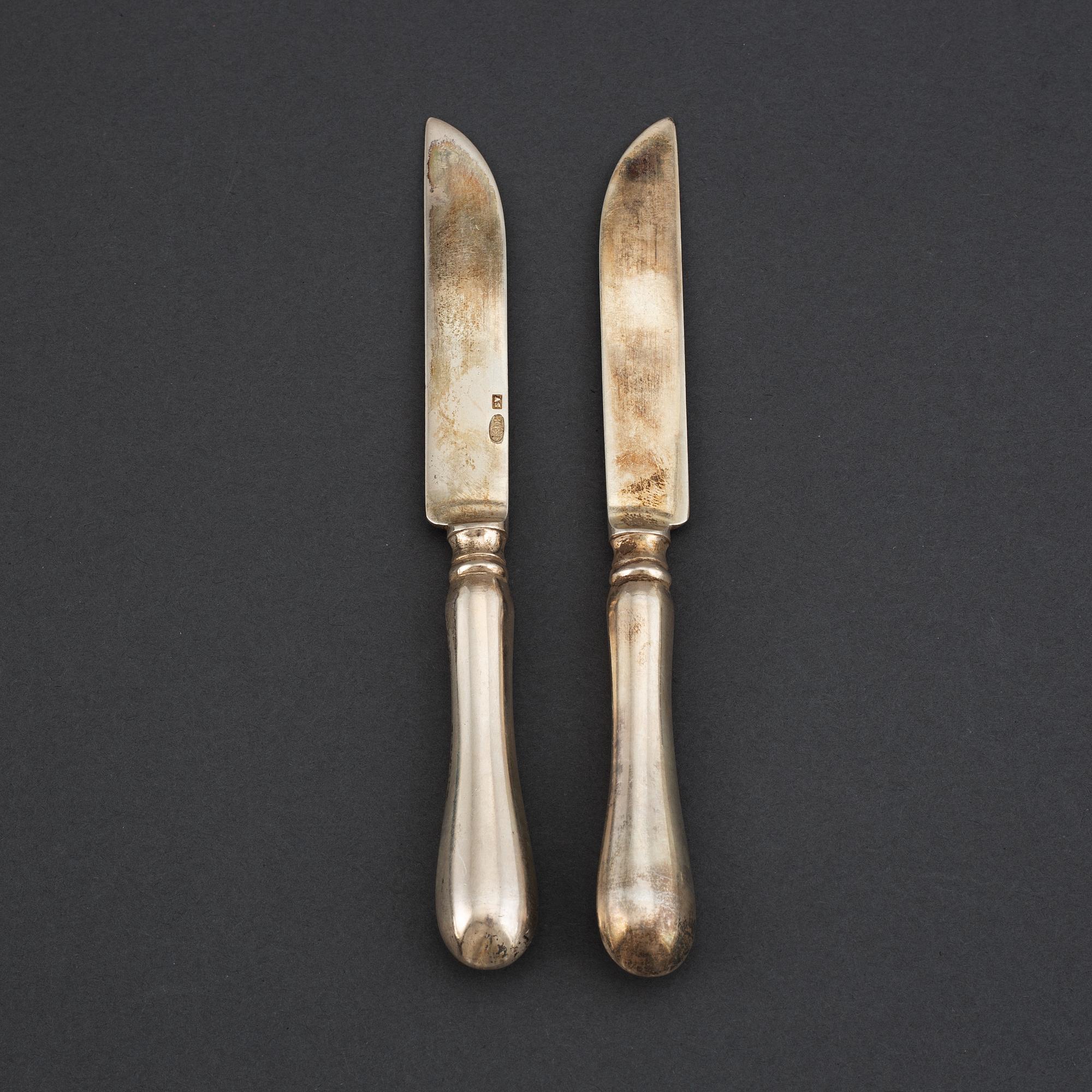 A set of 12 Russian silver chees/fruit knives, mark possibly of Adolf Speer, St. Petersburg 1898-1903.