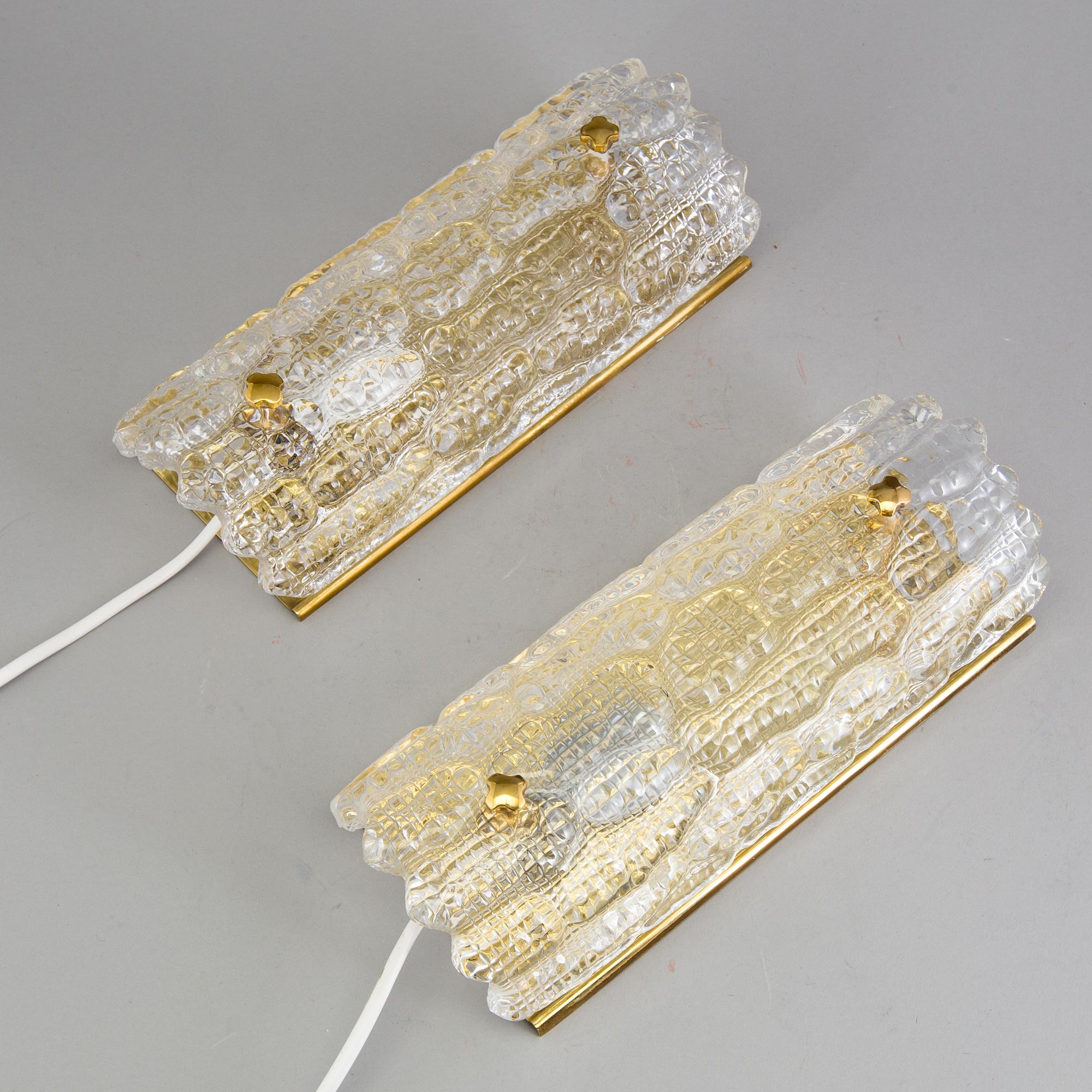 A pair of wall lamps by Carl Fagerlund, 20th century.