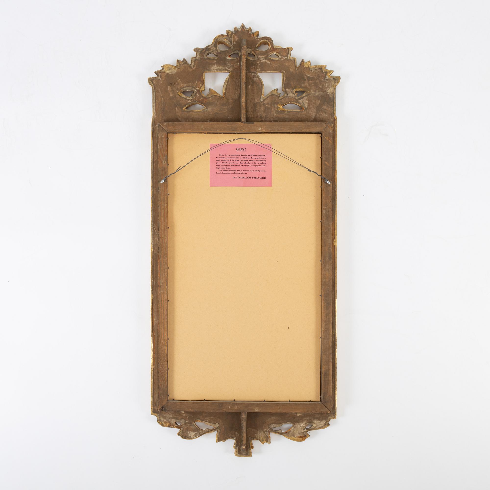 A Gustavian style mirror, mid 20th Century.