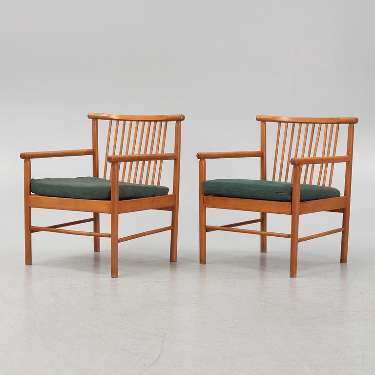 A pair of armchairs, mid 20th Century.