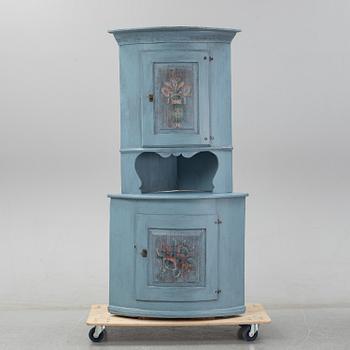 A painted pine corner cabinet, dated 1837.