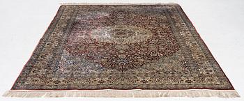 Carpet, part silk, approx. 240 x 158 cm.