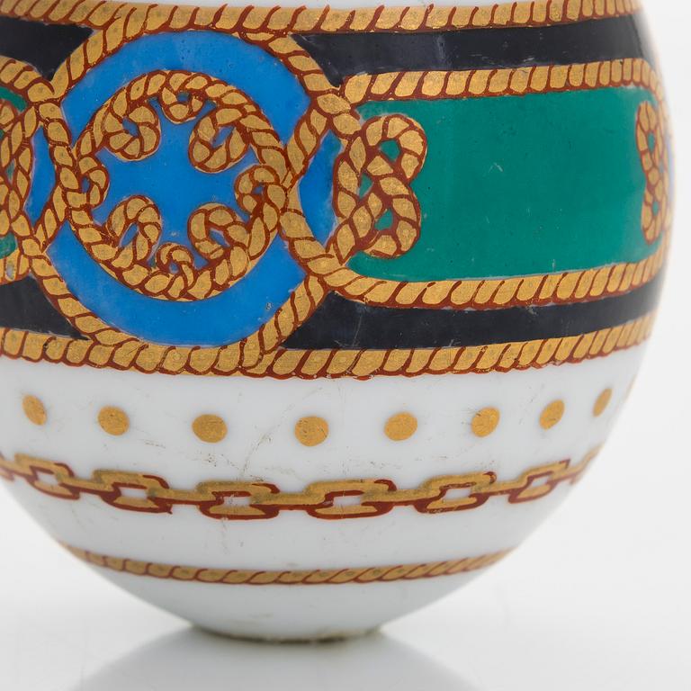 A Russian porcelain egg, part of the Derzhava service,Imperial Porcelain Factory, Saint Petersburg late 19th century.